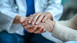 © Carmen - Female doctor's hands holding and comforting female patient's hands, bedside manner, copy space