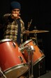 © Rodrigo - male drummer makes a gesture to the camera