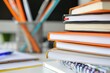 © Ольга Лукьяненко - Close-up of a stack of textbooks on a desk, education concept