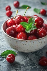 Canvas Print - Fresh Cherries in a Bowl with Mint Leaves