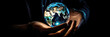 © seanzheng - generated illustration of close up of businessman holding in palms glowing earth globe.