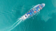 © Yellow Boat - Cargo container ship carrying container and running in the ocean near international container port customs shipyard sea port concept smart logistic service. transportation logistics trading..
