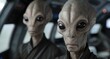 © Balaraw - Close-up of two alien beings in a spaceship