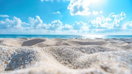 Closeup of sand on beach and blue summer sky