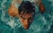 © Radianshots - Close Up of a Man Swimming Underwater in a Pool
