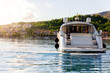 © Kyryl Gorlov - Scenic back view luxury private yacht boat sail at Croatian bay harbor shore blue turquoise clear water bright summer sunny sunset sunrise morning. Rich quality lifestyle. Boat vessel charter service