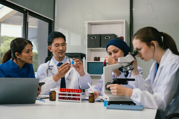 Wall Mural - doctor team, analysis the blood test examination results and medication usage of the patient on the 