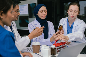 Wall Mural - doctor team, analysis the blood test examination results and medication usage of the patient on the 