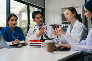 Wall Mural - doctor team, analysis the blood test examination results and medication usage of the patient on the 
