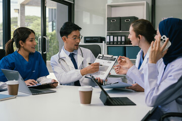 Wall Mural - doctor team, analysis the blood test examination results and medication usage of the patient on the 