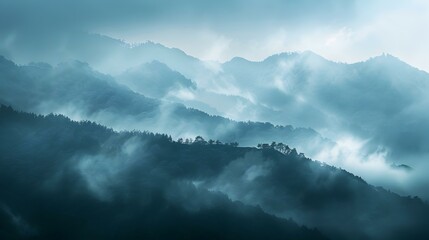 Canvas Print - Mountains shrouded in thick fog in which img