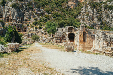 Wall Mural - Myra Ancient City. Ancient Lycian rock tombs are stone tombs in Turkey. Historical ancient place in Demre. Antalya, Turkey.