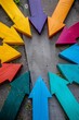 © grey - Arrows of various colors pointing at a blank center area, symbolizing coordinated effort.