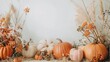 © 2rogan - Bohemian inspired autumn decor featuring pumpkins dried blooms and empty area for text