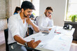 © NDABCREATIVITY - Team of young creative marketing business experts brainstorming during work at startup office