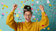 © fotogurme - '' bingo winner holding up their winning card with a joyful expression and confetti falling