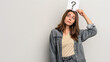 © Furkan - Business concept. Question mark icon above the businesswoman's head. An employee who is confused about his job. Woman asking questions during brainstorming.