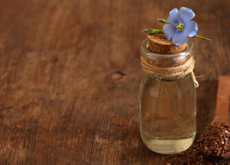 Wall Mural - organic flaxseed oil on wooden table