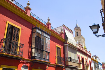 Vintage historical house and narrow street in downtown in Seville, Spain