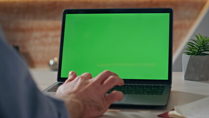 Wall Mural - Manager hands scrolling mockup laptop computer touchpad at office desk closeup