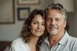 © CogniLens - Portrait of a tender couple in their 40s donning a classy polo shirt on modern minimalist interior
