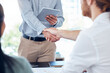 © AzeemudDeen/peopleimages.com - Hiring, handshake and business people in office with welcome for interview, job opportunity or recruitment. Meeting, human resources and candidate shaking hands for greeting, onboarding or employment