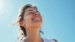 © The Little Hut - Horizontal portrait of a beautiful young fit smiling woman deep breathing in front of a clear blue sky in a sunny windy day of summer : Generative AI
