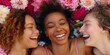 © Anastasiia - Girls sharing laughter and camaraderie amidst vibrant flowers. Concept Friendship, Laughter, Camaraderie, Flowers, Girls