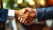 © aditya - greeting agreement, agreement between two people in running a business, shaking hands closely working together