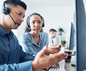 Wall Mural - Pointing, call center and people with teamwork, computer and woman with help for man, coworking and conversation. Desk, online and research for question, inquiry and customer service or telemarketing