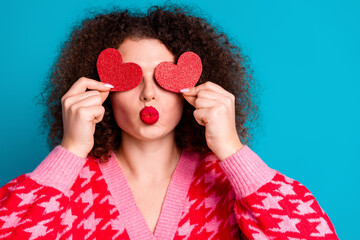 Wall Mural - Photo of adorable lovely girl wear red cardigan kissing you hearts cover eyes empty space isolated blue color background