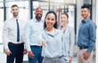 © M. Cunningham/peopleimages.com - Portrait, handshake and business people with recruitment, hiring and onboarding in modern office. Face, group and employees with teamwork, cooperation and agreement with partnership and thank you