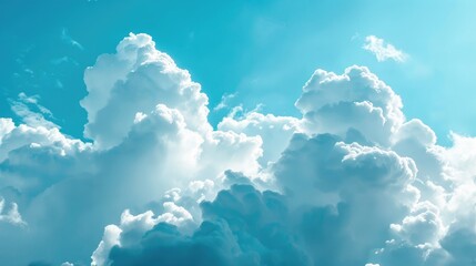 Canvas Print - Fluffy white cumulus clouds against a vibrant blue sky