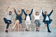 © Van Wyk/peopleimages.com - People, recruitment or success on chair with hands or celebration, portrait with onboarding in office. Team, row or corporate company with staff diversity for hr, arms raised for job with solidarity