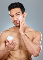 Canvas Print - Asian man, cream and portrait for skincare, beauty and moisturiser on white background. Container, face and grooming from hydration for male person, lotion and bodycare for dermatology and selfcare