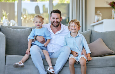 Poster - Happy, bonding and dad with children on sofa for fathers day celebration with relaxing together at home. Smile, love and portrait of man hug kids with care, comfort and pride in living room at house.