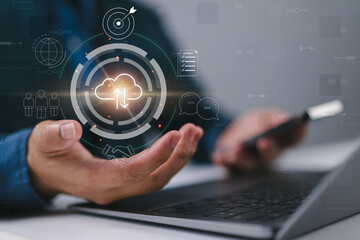 Fototapete - man use Laptop with cloud computing diagram show on hand. Cloud technology. Data storage. Networking and internet service concept.