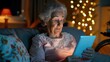 © AnyPic289 - Senior Woman Using Tablet at Home illuminated by warm indoor lighting and surrounded by cozy decor.