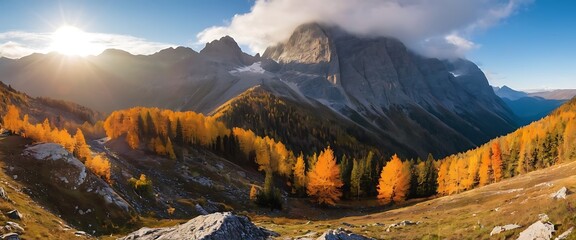 Wall Mural - mountain range in autumn. The mountains are colorful with yellows, oranges, and reds from changing leaves. The sky is a clear blue with some white puffy clouds. There are also some evergreen trees