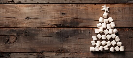 Aufkleber - A Christmas tree made of marshmallows on a wooden backdrop with room for copy space image.