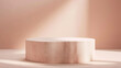 © Mahmud - A round podium or pedestal colored in peach fuzz, with a soft background. This mockup is ideal for product display or presentations. It's a 3D render.
