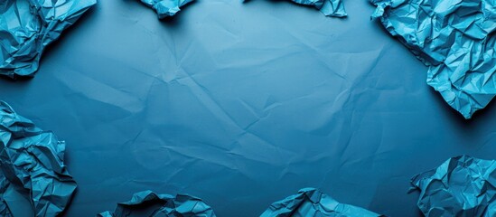 Fototapete - Background featuring crumpled blue paper with copy space image.