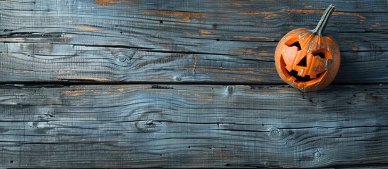 Poster - Wooden background displaying a pumpkin head with a suitable area for additional image or text.
