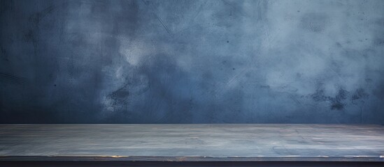 Leinwandbilder - A dark blue concrete wall with an aged texture, ideal for showcasing products with a copy space image to design interiors efficiently.