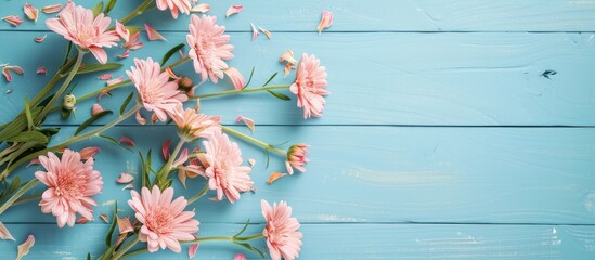 Leinwandbilder - Card mockup with floral decor on a blue wooden background and greeting card mockup featuring pink fresh flowers on a table have the same design with copy space images