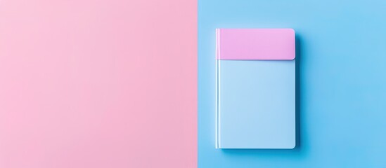 Wall Mural - Rectangular small notepad in pink and blue hues on white background with copy space image