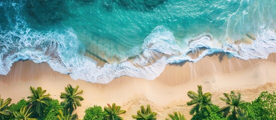 Aufkleber - Sunny tropical beach scene with a gentle sea wave rolling on the sand and plenty of copy space for adding text or images in the top down view
