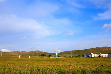 Wall Mural - Radio telescope observatory and the blue sky white clouds