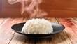 © Thaivb.NET - Warm, tender rice grains, glistening with moisture. A blank canvas for flavors, offering comfort and sustenance in every spoonful.