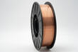 © Mikus - Copper welding wire spool for industrial and commercial use on a white background – close-up view of precision engineered wire on durable plastic reel high-quality.